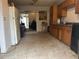 Kitchen with wood cabinets, appliances, and tile floor at 271 Andrew Hairston Nw, Atlanta, GA 30314