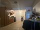 Simple kitchen with wood cabinets and tile floor at 271 Andrew Hairston Nw, Atlanta, GA 30314