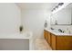 Bathroom with double vanity and garden tub at 5862 Homestead Cir, Rex, GA 30273