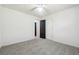 Bright bedroom with ceiling fan and carpet at 5862 Homestead Cir, Rex, GA 30273