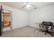 Bedroom with desk, chair, and view into another room at 5862 Homestead Cir, Rex, GA 30273
