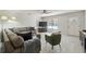 Open living area showcasing ample natural light and a cozy atmosphere at 5862 Homestead Cir, Rex, GA 30273