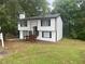 Two-story house with white siding and black accents at 2290 Wilkins Cv, Decatur, GA 30035
