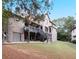 Home with deck and stairs leading to backyard at 1255 Mcminn Way, Snellville, GA 30078