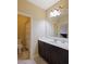 Basement bathroom with dark vanity, shower, and toilet at 1255 Mcminn Way, Snellville, GA 30078