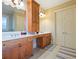Bathroom with double vanity and large medicine cabinet at 1255 Mcminn Way, Snellville, GA 30078