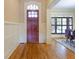 Grand entryway with hardwood floors and a solid wood door at 1255 Mcminn Way, Snellville, GA 30078