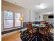 Basement game room with round table, chairs, and a window with blinds at 1255 Mcminn Way, Snellville, GA 30078