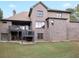 Brick house exterior with large deck and landscaped yard at 1255 Mcminn Way, Snellville, GA 30078