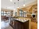 Open kitchen with breakfast bar, island and view to the living room at 1255 Mcminn Way, Snellville, GA 30078