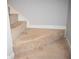 Carpeted basement stairs leading to the upper level at 237 Chads Ford Way, Roswell, GA 30076