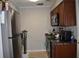 Galley kitchen with stainless steel appliances at 237 Chads Ford Way, Roswell, GA 30076