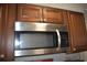 Stainless steel microwave installed above cabinets at 237 Chads Ford Way, Roswell, GA 30076