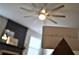 Industrial style ceiling fan in living room at 3144 Delacorte Dr, Acworth, GA 30101