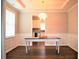 Formal dining room with hardwood floors and view of kitchen at 3144 Delacorte Dr, Acworth, GA 30101