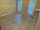 Dining area with vinyl plank flooring and access to backyard at 230 Valley Xing, Canton, GA 30114