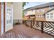 Private deck with wood flooring and views of neighboring townhouses at 4658 Ivygate Se Cir, Atlanta, GA 30339