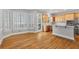 Bright kitchen with hardwood floors, an island, and stainless steel appliances at 4658 Ivygate Se Cir, Atlanta, GA 30339