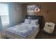Bedroom with a queen-size bed and accent chair at 5626 Laurel Ridge Dr, Atlanta, GA 30344
