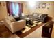 Living room with two sofas, coffee table, and patterned rug at 5626 Laurel Ridge Dr, Atlanta, GA 30344
