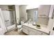 Accessible bathroom with shower, tub, and updated vanity at 300 Johnson Ferry Rd # B711, Atlanta, GA 30328