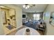 Bright living room features comfy seating and a view at 300 Johnson Ferry Rd # B711, Atlanta, GA 30328