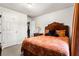 Cozy bedroom with a double bed and wood headboard at 2615 Turtle Ter, Grayson, GA 30017