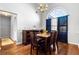 Dining room with hardwood floors and a wood table at 2615 Turtle Ter, Grayson, GA 30017