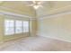 Spacious bedroom with carpeting and a ceiling fan at 3520 Prairie Dr, Snellville, GA 30039