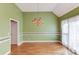 Formal dining room with hardwood floors and chandelier at 3520 Prairie Dr, Snellville, GA 30039