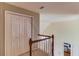 Upstairs hallway with double doors and access to other rooms at 3520 Prairie Dr, Snellville, GA 30039