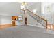 Two-story living room with hardwood floors and fireplace at 2443 High Meadows Ct, Conyers, GA 30094