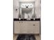 Bathroom with dark countertop, white cabinets, and a bathtub at 970 Sidney Marcus Ne Blvd # 1316, Atlanta, GA 30324