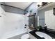 Bathroom with a bathtub, shower, and floating shelves at 970 Sidney Marcus Ne Blvd # 1316, Atlanta, GA 30324