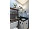 Bathroom with a sink, toilet, and floating shelves at 970 Sidney Marcus Ne Blvd # 1316, Atlanta, GA 30324