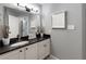 Bathroom with dark countertop, white cabinets, and a sink at 970 Sidney Marcus Ne Blvd # 1316, Atlanta, GA 30324