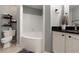 Bathroom with corner bathtub and granite vanity at 970 Sidney Marcus Ne Blvd # 1316, Atlanta, GA 30324