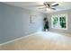Spacious bedroom with large window and ceiling fan at 970 Sidney Marcus Ne Blvd # 1316, Atlanta, GA 30324