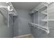 Bright walk-in closet, custom shelving and rods at 970 Sidney Marcus Ne Blvd # 1316, Atlanta, GA 30324