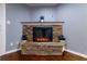 Stone corner fireplace with electric insert at 970 Sidney Marcus Ne Blvd # 1316, Atlanta, GA 30324