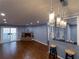 Open living area with hardwood floors, fireplace and breakfast bar at 970 Sidney Marcus Ne Blvd # 1316, Atlanta, GA 30324