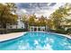 Community pool area with a pergola and landscaping at 970 Sidney Marcus Ne Blvd # 1316, Atlanta, GA 30324