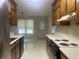 Kitchen with wood cabinets and appliances at 177 Simeon Dr, Mcdonough, GA 30252