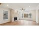 Spacious living room with hardwood floors and fireplace at 107 Cumming St, Alpharetta, GA 30009