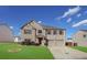 Two-story brick house with a two-car garage and landscaping at 55 Mary Jane Ln, Covington, GA 30016