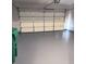 Garage with freshly painted floor and overhead door at 600 Shadow Oaks Dr, Stone Mountain, GA 30087