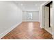 Bright basement room with herringbone floors and large window at 67 Highcrest Dr, Acworth, GA 30101