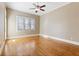 Bright bedroom with hardwood floors and a ceiling fan at 67 Highcrest Dr, Acworth, GA 30101