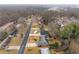 Aerial view of neighborhood and homes at 1283 Woodleigh Sw Rd, Marietta, GA 30008