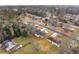 Aerial view showing the home's position on a residential street at 1283 Woodleigh Sw Rd, Marietta, GA 30008